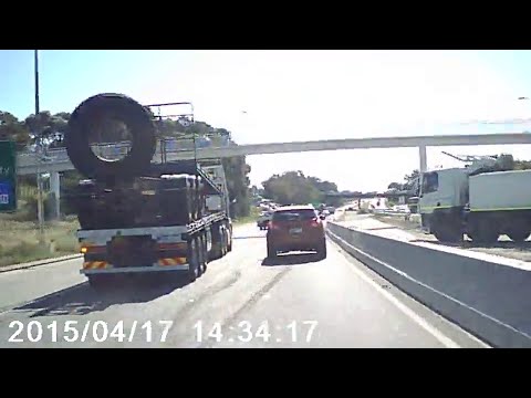 Truck Tyre falls off and hits car - Perth W.A