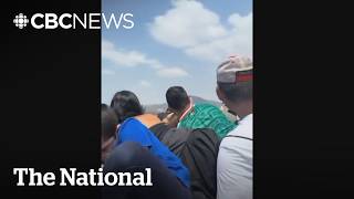 Witness video shows tourists taking cover during Mexico shooting