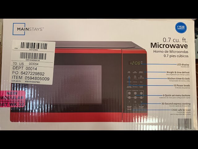 Mainstays 0.7 Cu ft Compact Countertop Microwave Oven, Red