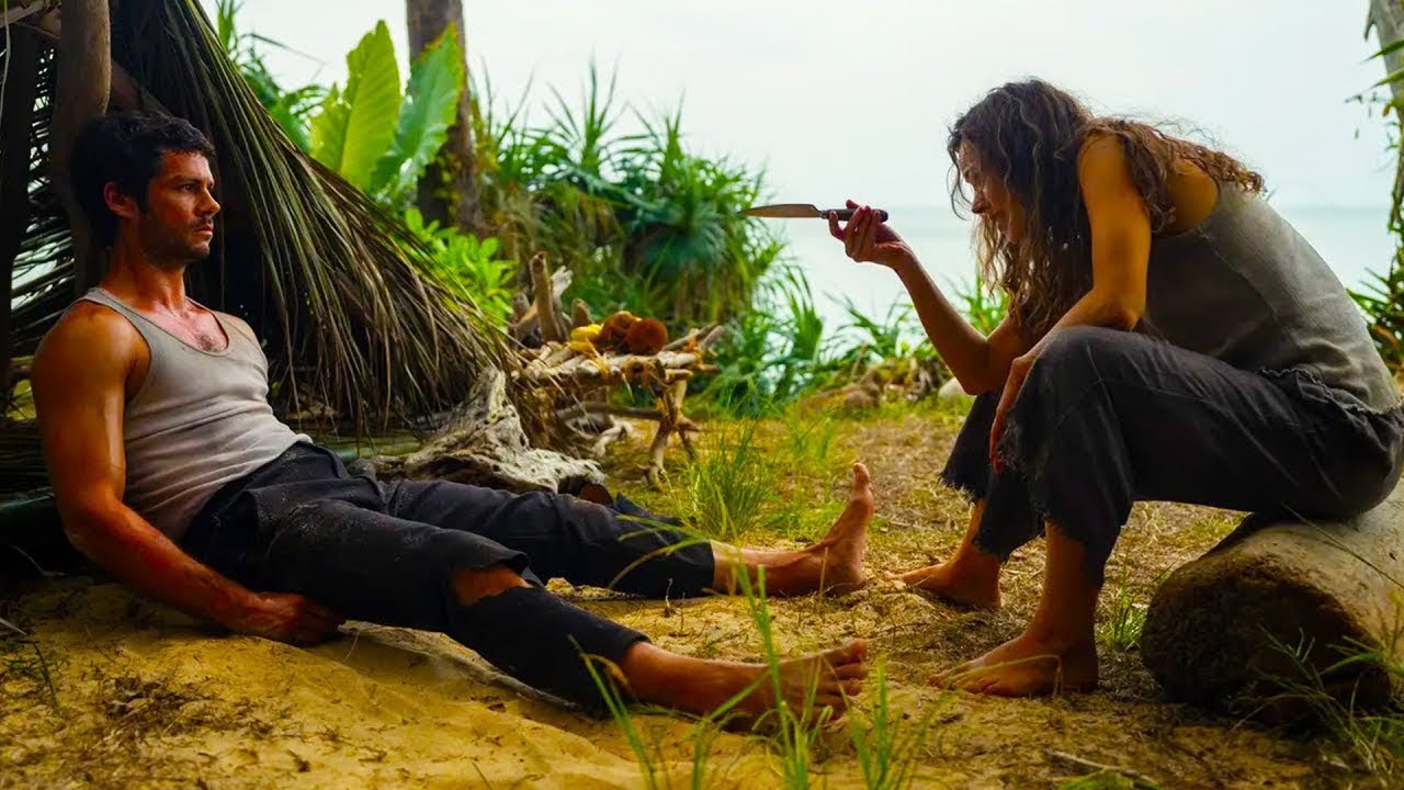 Boss And Naive Coworker Get Stuck On A Deserted Island, Unaware She Is More Dangerous Than She Looks