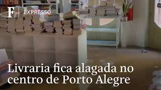 Enchente em Porto Alegre inunda livraria Taverna e põe em risco móveis e livros