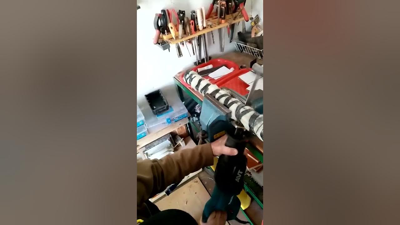 Cutting a muffler pipe braided with hard steel wires and fiberglass