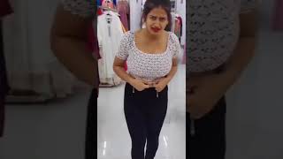 Changing Dress At Trail Room In Shopping Mall