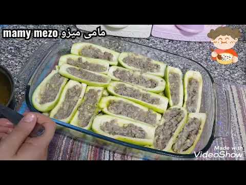 طريقه عمل قوارب الكوسه باللحمه المفرومه بالبشاميل كوسه بالبشاميل صنيه الكوسه بالبشاميل مراكب الكوسه