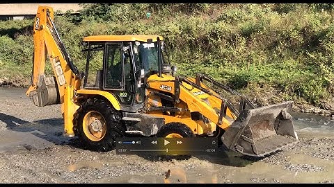 JCB Backhoe 3DX Machine Working River Area - JCB Making A Dam In River