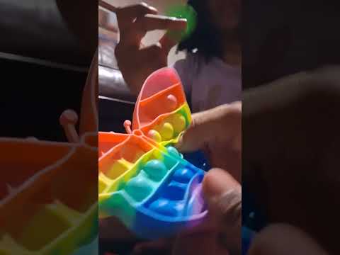 Elliston and Raelyn playing poppits