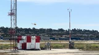 Robinson R44 Helicopter taking off from Torrance Airport 