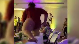 drunk Lizzo jumps on table and breaks it
