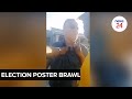 Watch  poles apart angry east london resident scuffles with anc election poster crew