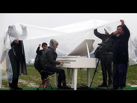 Refugee plays piano for first time in three years after Ai Weiwei brings instrument to Idomeni camp