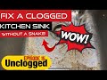 Clogged kitchen sink fixed by hand | Unclogged Episode 15