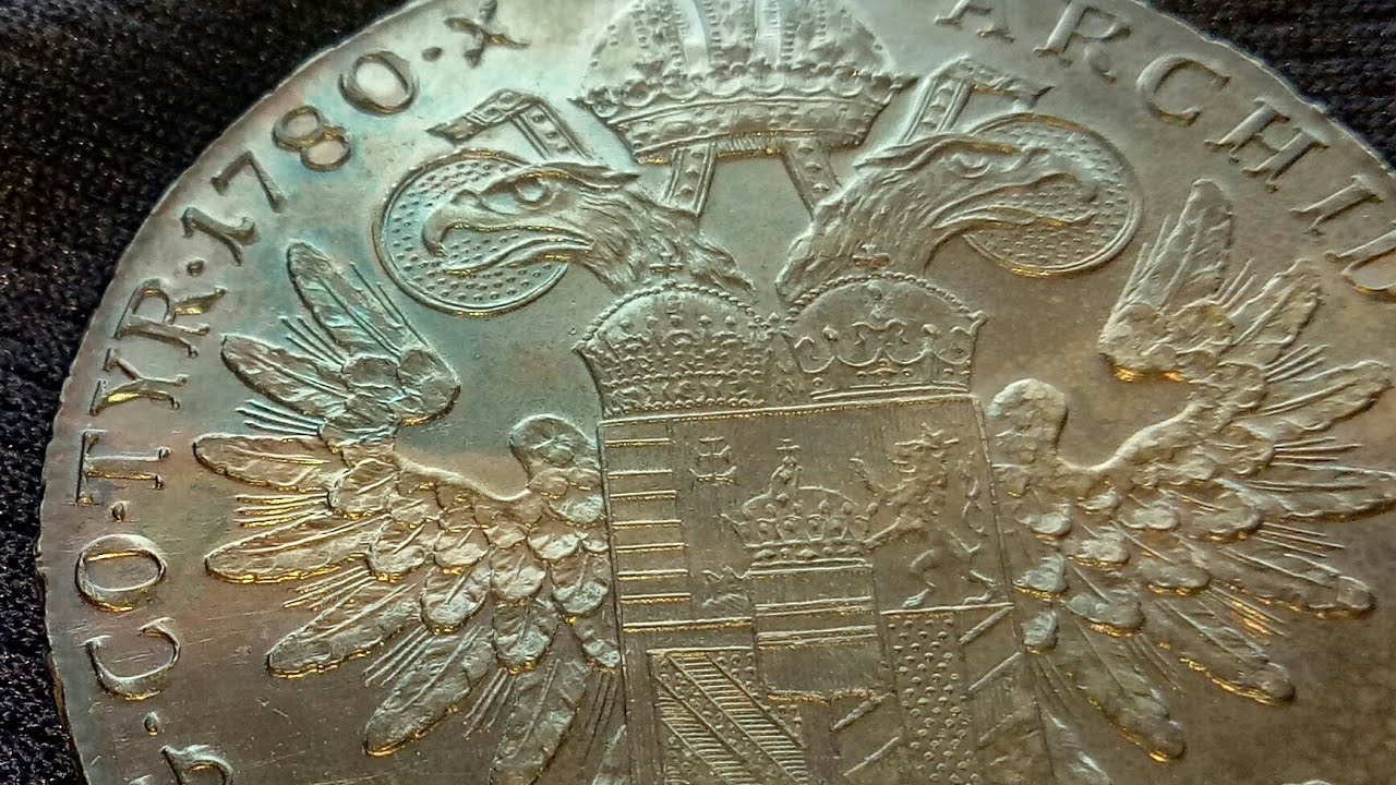 Empress Maria Theresa Coin, 1780 restrike thaler with dark blue & brown toning.