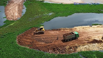 Impressive never seen bulldozer use power to push wet soil build new road connecting