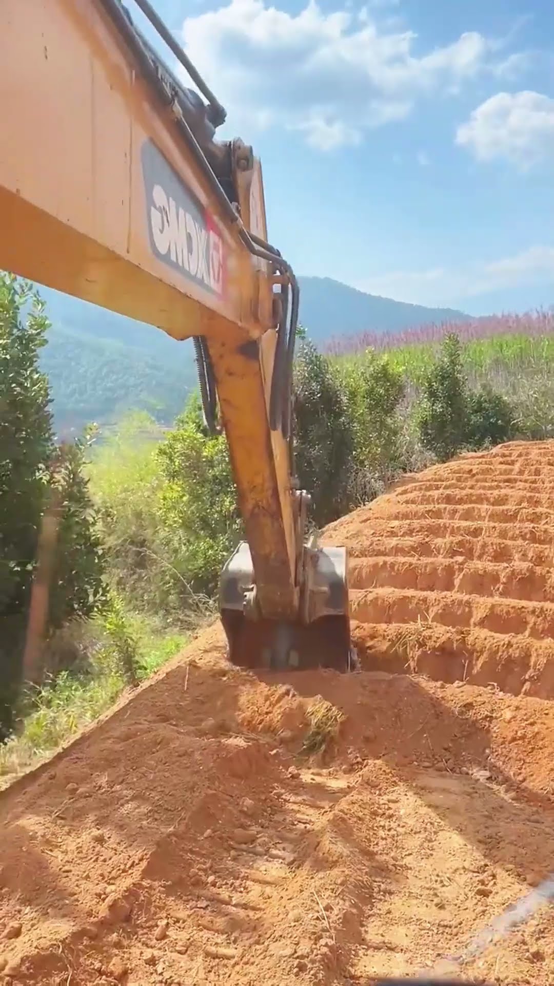 Digging bucket turns the planting soil process- Good tools and machinery make work easy