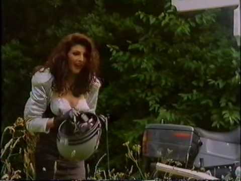 Actress Gina Bellman In Crash Helmet from Black Ey...