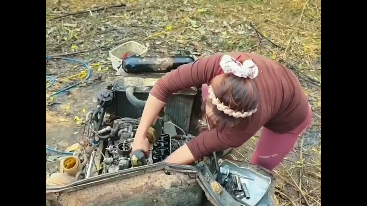 Girl repairing a car in the forest & the queen of camping