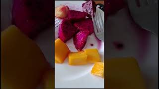 My mom tries mango and dragonfruit for the first time!