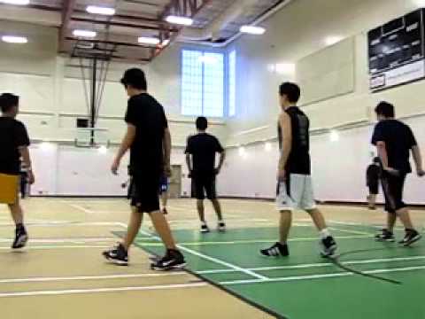 Kevin and Kenneth playing basketball in Canada