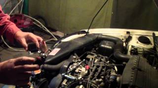 2002 Subaru Outback sedan changing headlight bulb