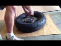 Removing and replacing a motorcycle tire from the rim.