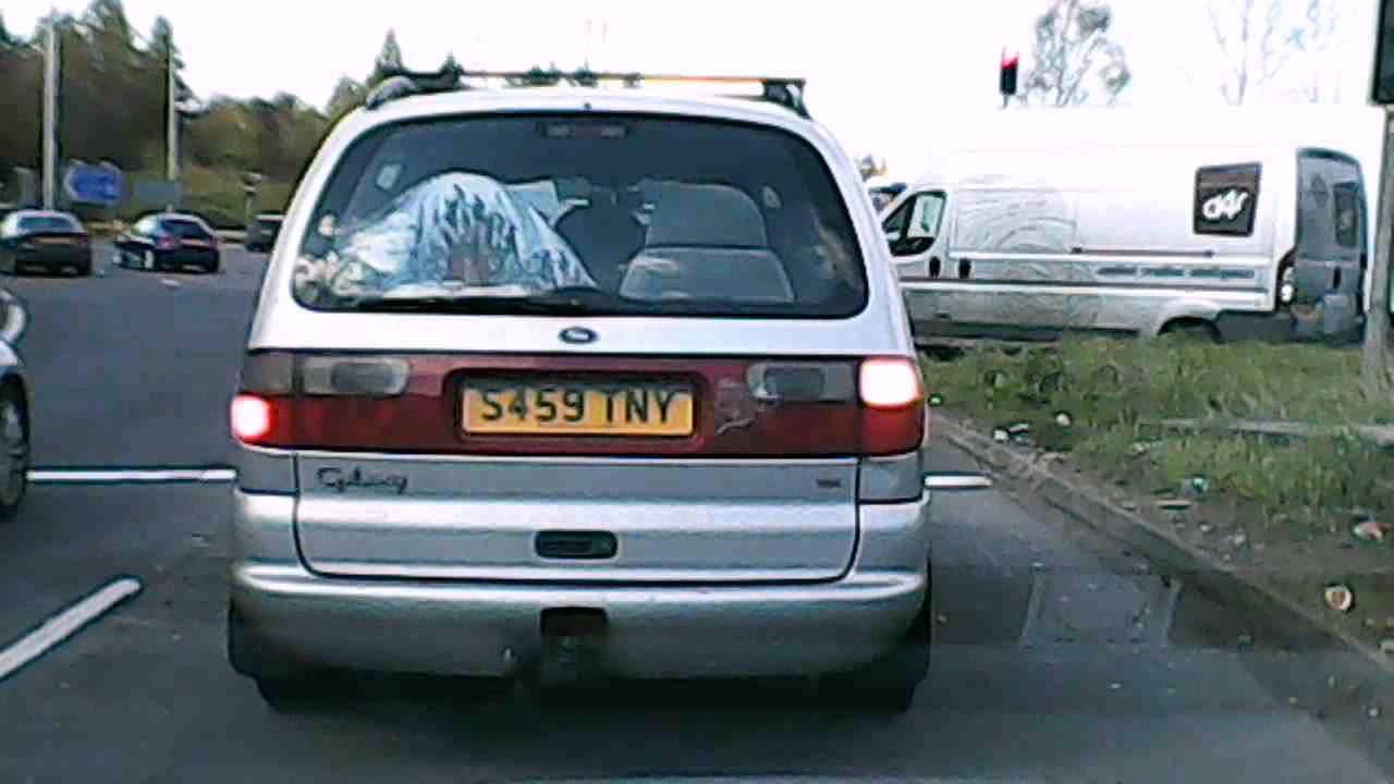 Driver and pessanger drop rubish out of the car on M1, Junction 21, Leicester
