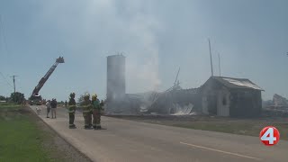 Crews respond to large barn fire in Byron