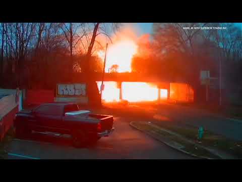 VIDEO: Indianapolis trash truck bursts into flames after striking rail overpass