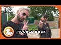 All Time Low Play A Game Of 'Hook A Duck' - Festival Funfair