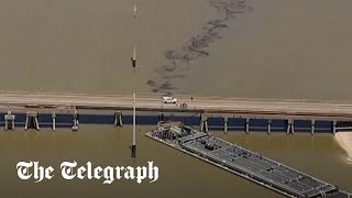 video: Watch: Barge hits Texas bridge and causes oil spill