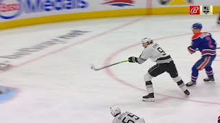 Adrian Kempe tips the puck from mid-air on a pass from Anže Kopitar for his second goal of the game.