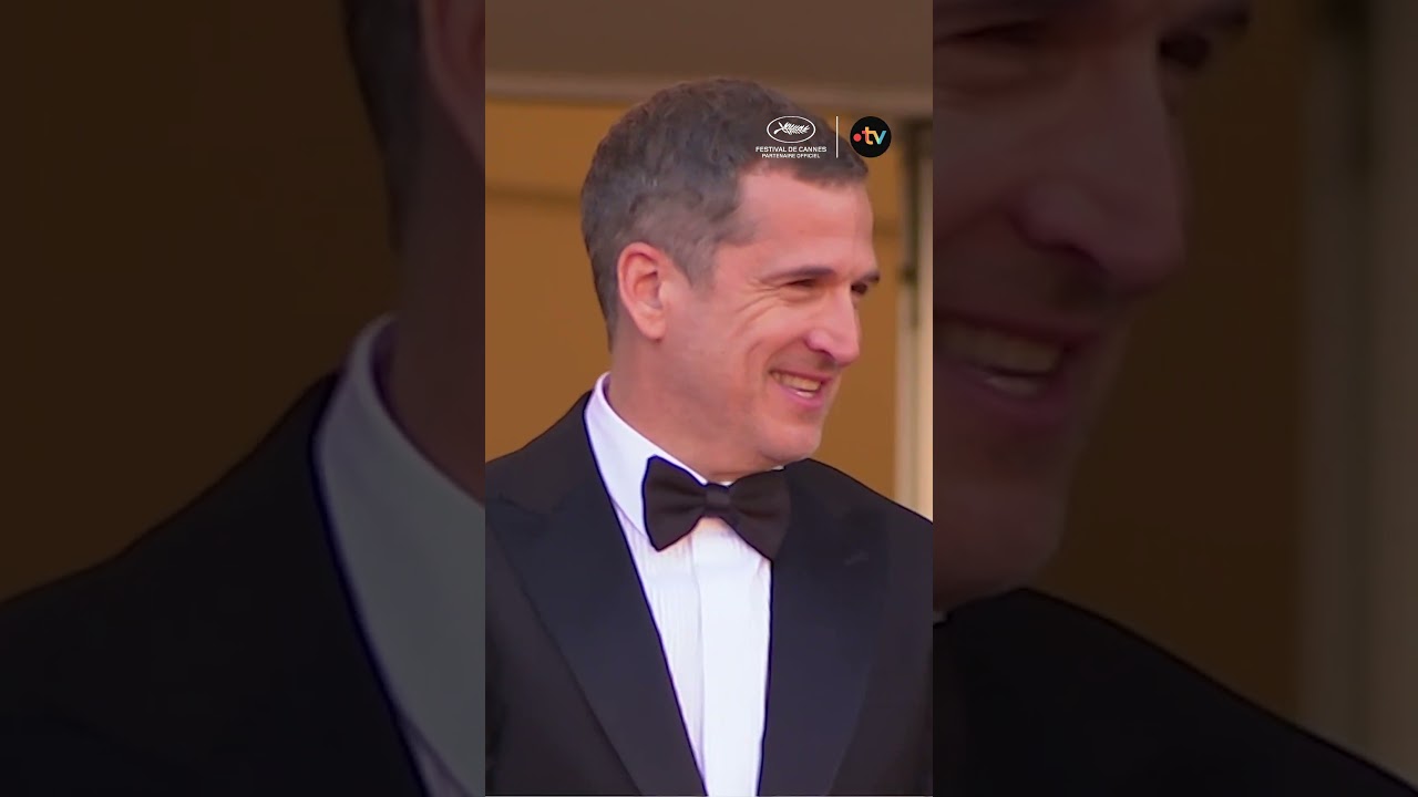 Guillaume Canet et Marion Cotillard sur le tapis rouge pour Karma aux côtés de leur fils