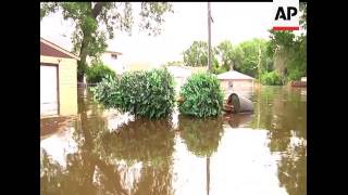 Airboats patrolled the streets of Minot, North Dakota Friday as flood waters continued to rise at a