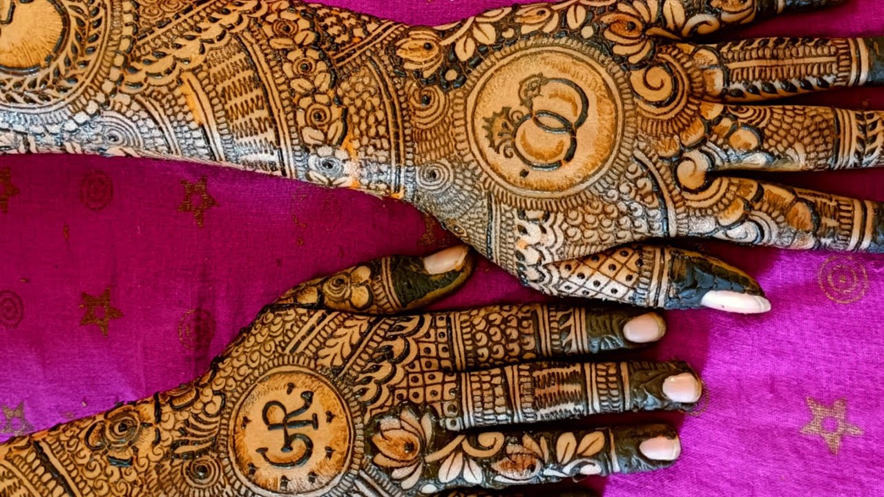 Indian bride showing her engagement ring and mehndi art. | Photo 257955