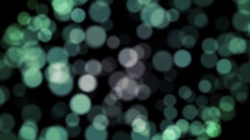 bokeh green particle background loop animation - Download Stock Footage