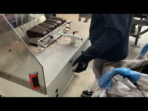 Semi-automatic peat briquette packing machine by UMP Technika