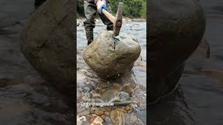 he cracked this river rock and found green jade inside #jade #greenjade #jadeite #nephrite #gemstone