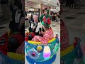 Julian and Cate taking a wee ride in Ards Shopping Centre to kick off Christmas on BBC Radio Ulster.