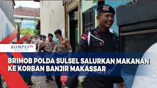 Brimob Polda Salurkan Makanan Bagi Korban Banjir