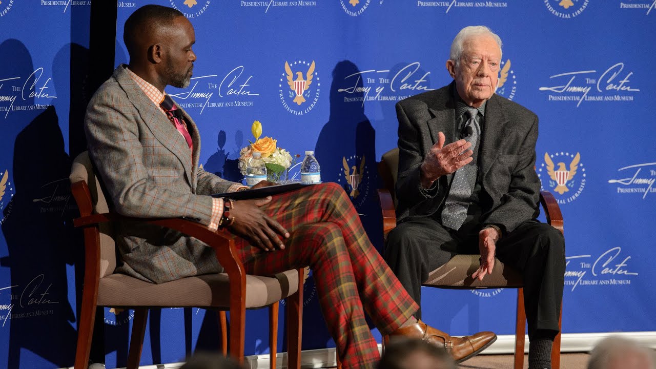 Film backdrop image for Jimmy Carter & Derreck Kayongo: National Conversation on in Atlanta Highlights (2016)