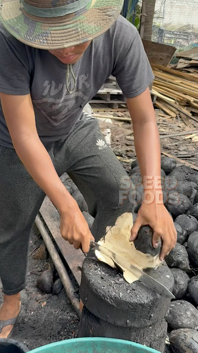 Thailand’s Hot Roasted Coconut Peeling