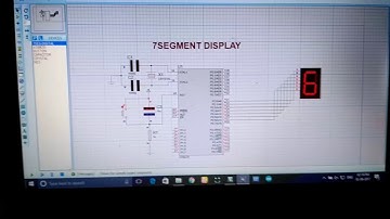 how to use 7 segment display by using 8051 micro controller in proteus 8