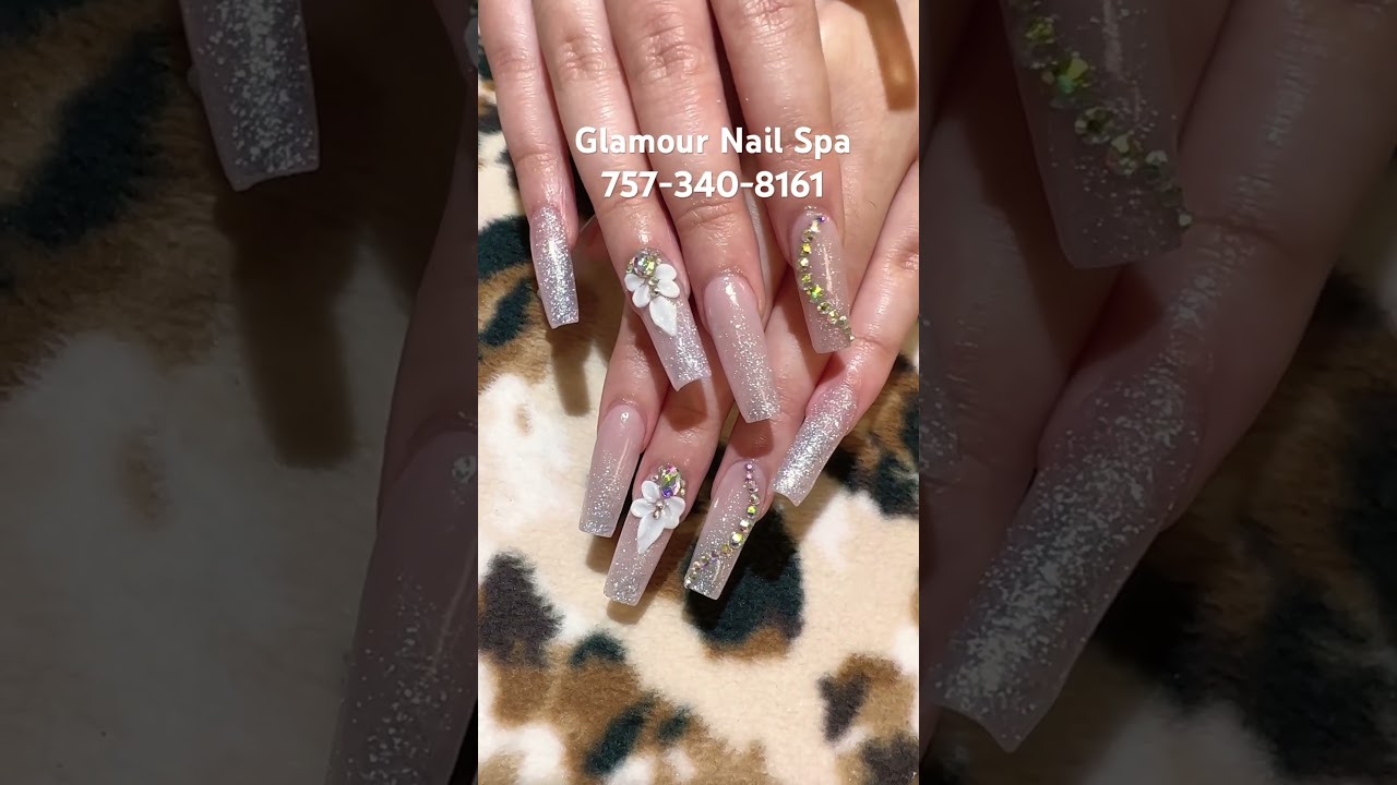 Prom nails with 3D flowers designed. Call Glamour Nail Spa 757-340-8161 to book an appointment w us.