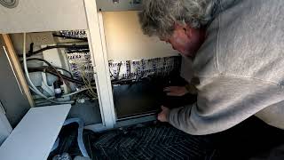 Eurovan solar panel pass through connector installation and new Bouge RV refrigerator.