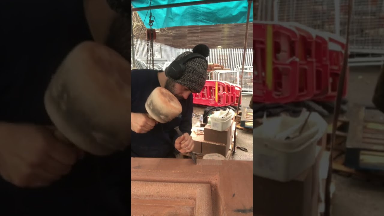 Carving historic two part stone lintel for Victorian clock tower in Scotland- Finishing touches.