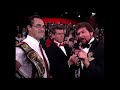 Wwf tag team champs money inc ted dibiase  irs with jimmy hart on the return of brutus beefcake