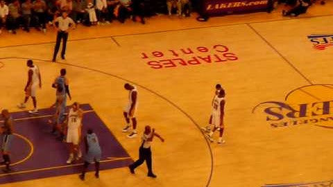 Andrew Bynum scores on Carlos Boozer