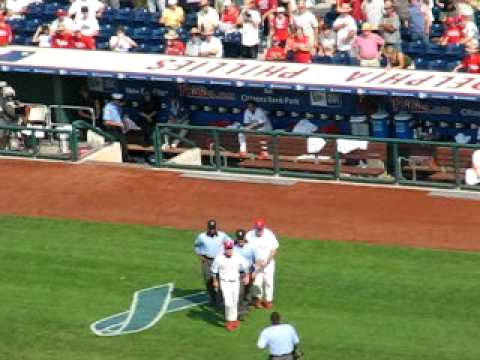 June 17th, 2007. Citizen's Bank Park in Philadelphia. The Phillies, down 7-4 to the Detroit Tigers, become frustrated and cannot hold back their anger any longer. After catcher Ruiz gets thrown out of the game for arguing with the home plate umpire (not shown), Phillies' manager Charlie Manuel discusses the situation with the umpire, and then gets thrown out himself. He continues to argue, getting his money's worth, and then while leaving the field, Phillies' base coach Steve Smith (in the dugout) gets thrown out by the first base umpire. He becomes livid and has to be restrained by Manuel. Sorry I didn't get the umpire throwing Smith out of the game, two guys walked in front of me which made me lose where I was. I was in section 431 (WAY upstairs) with a 10x optical zoom camera. UPDATE: I've disabled comments because they've pretty much run their course and I'm getting tired of the Mets fans and Phillie Phans swearing at each other