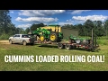 Dodge Cummins hauling a John Deere 5075E and disk to go farming