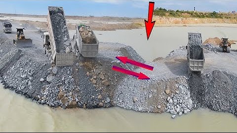 Nice Incredible Project Filling in Lake Build Road Bulldozer Pushing Stone and Truck Deliver