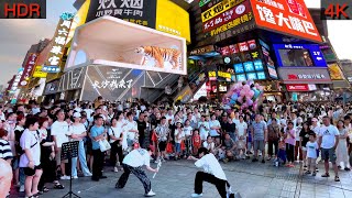 How does the busiest street in China compare to Times Square in New York? what's in here?